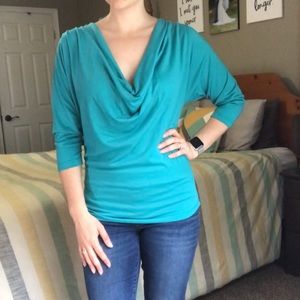 Scoop neck shirt with criss cross open back